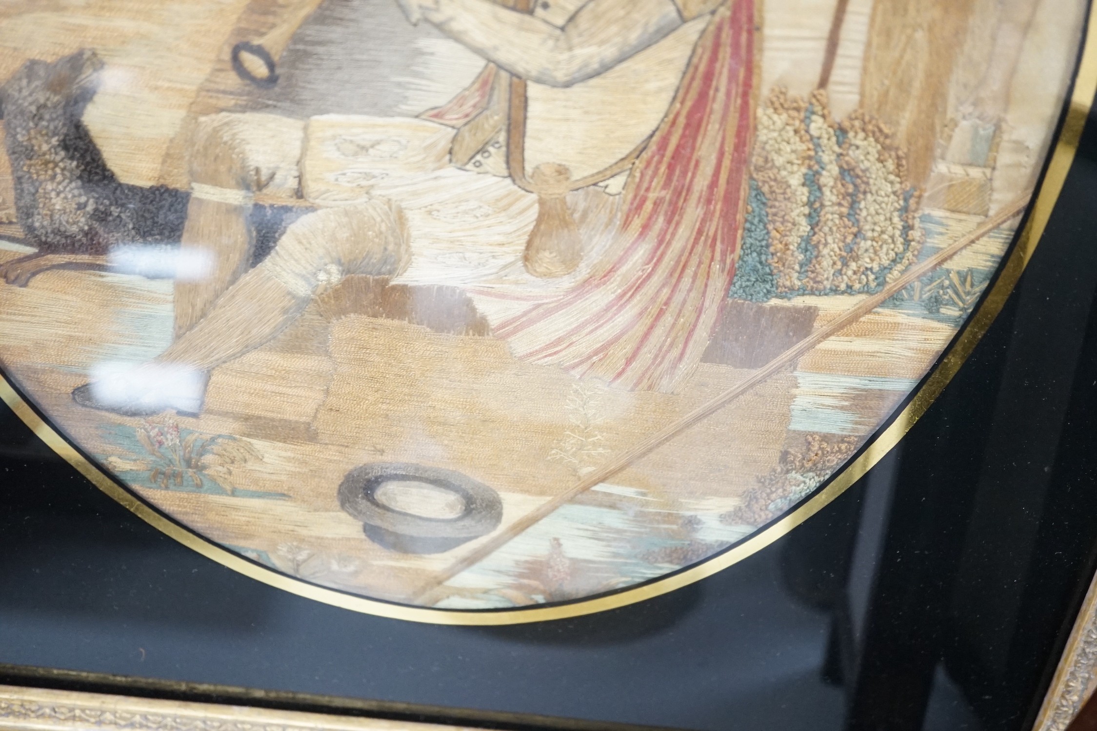 A framed Regency silkwork picture